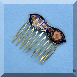 J02. Enameled haircomb. 